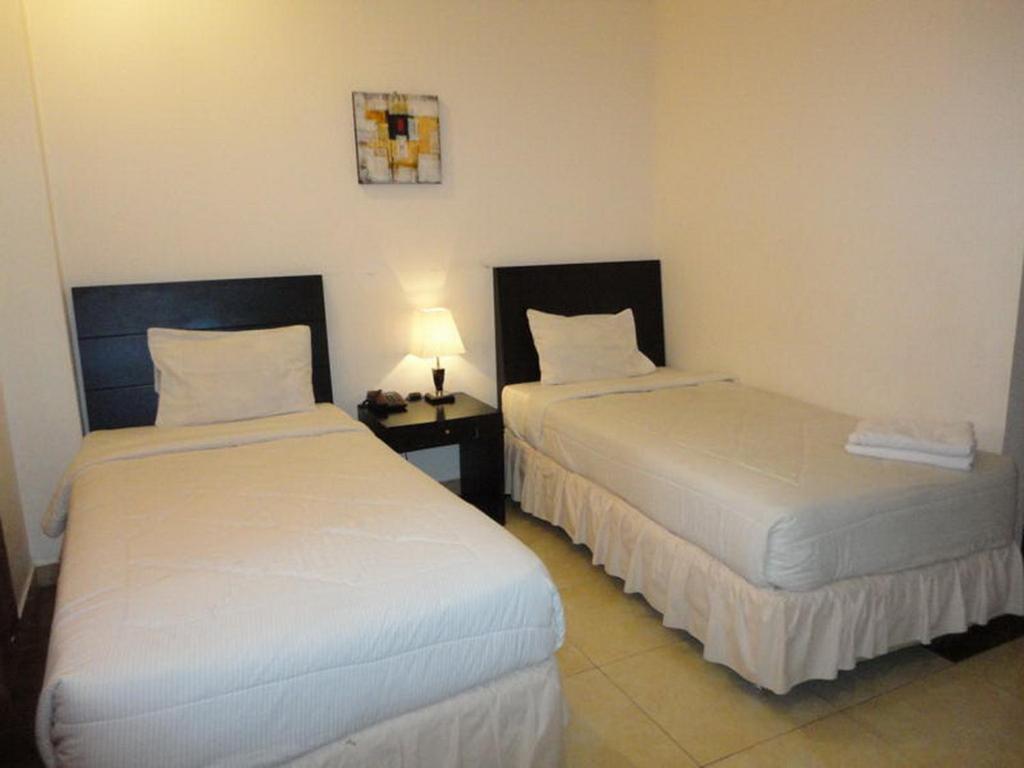 Grand Duta Hotel Palu Quarto foto